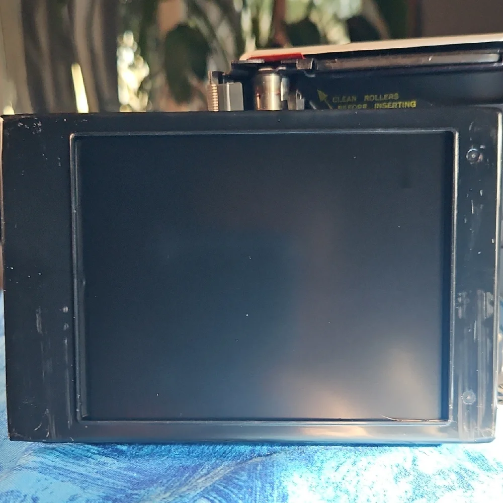 Polaroid Box with Navy Blue and Yellow Lettering